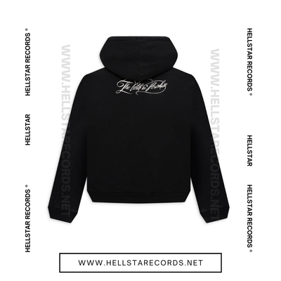 Back view of Hellstar Essentials Zip-Up Hoodie in Black with Hellstar graphics on chest and back.