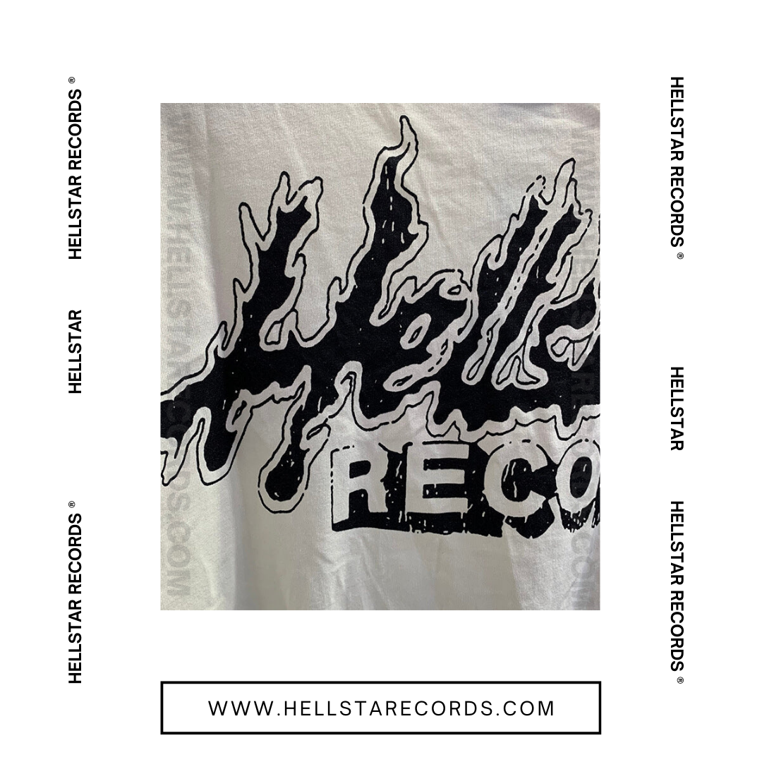 Close view of the Hellstar Heaven Sounds Like Tee in Cream with bold pink and black graphic design.