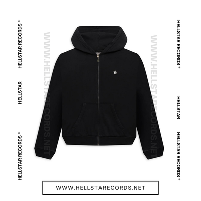 Front view of Hellstar Essentials Zip-Up Hoodie in Black with Hellstar graphics on chest and back.