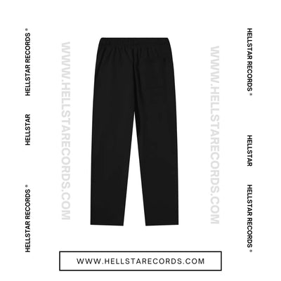 Back view of Hellstar Sports Future Flame Sweatpants featuring bold red and white flame graphics on black fabric.